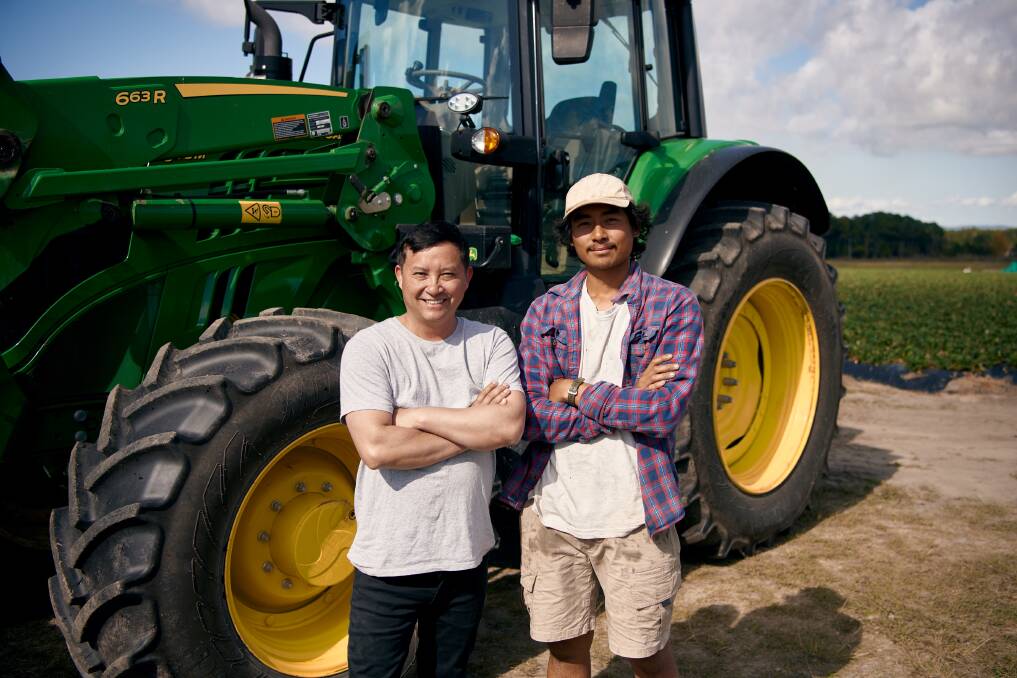 John Deere Financial's first customer, Oasis Berries owner, George Him and son Jet Nguyen. Picture supplied