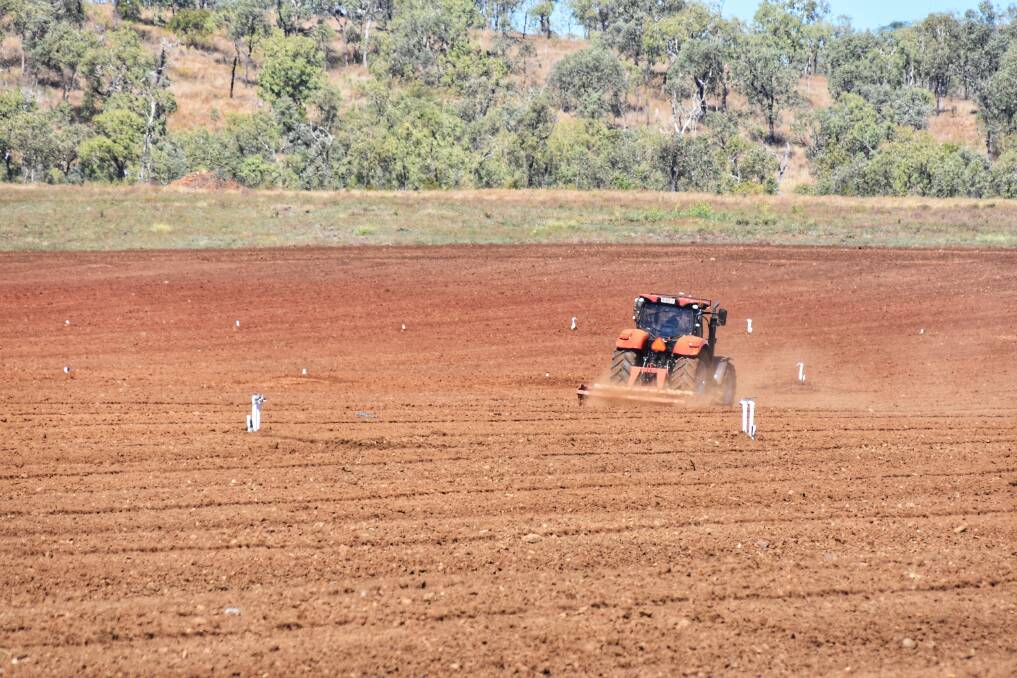 A tractor preparing the paddock at the Riverton Farm, making way for upcoming orchards. Picture: Ben Harden