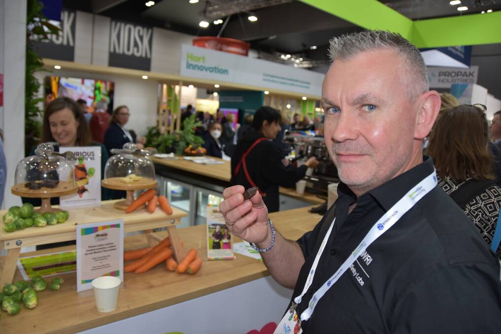 Neil Scrimgeour, Affinity Labs, SA tests out some Brussels sprouts chocolate at the Hort Innovation stand. Picture by Ashley Walmsley