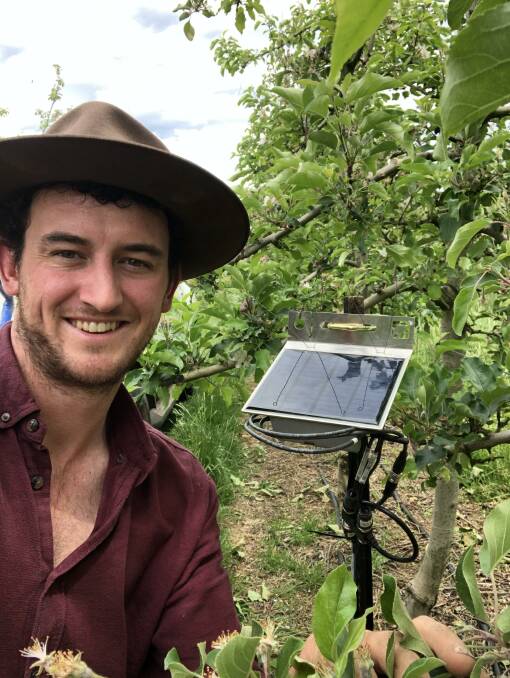 DPIRD research scientist Bill Bateman installs soil moisture sensors and a network logger in a Manjimup apple orchard, as part of a new drought resilience project to improve water use efficiency. Picture supplied
